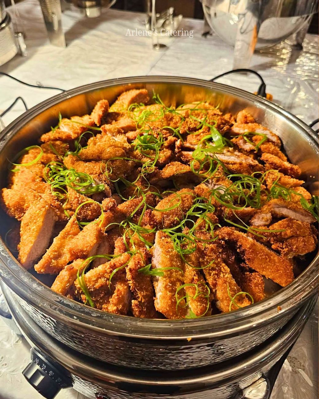 A tray of glazed fried chicken wings